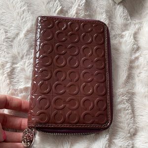 Coach leather planner.
